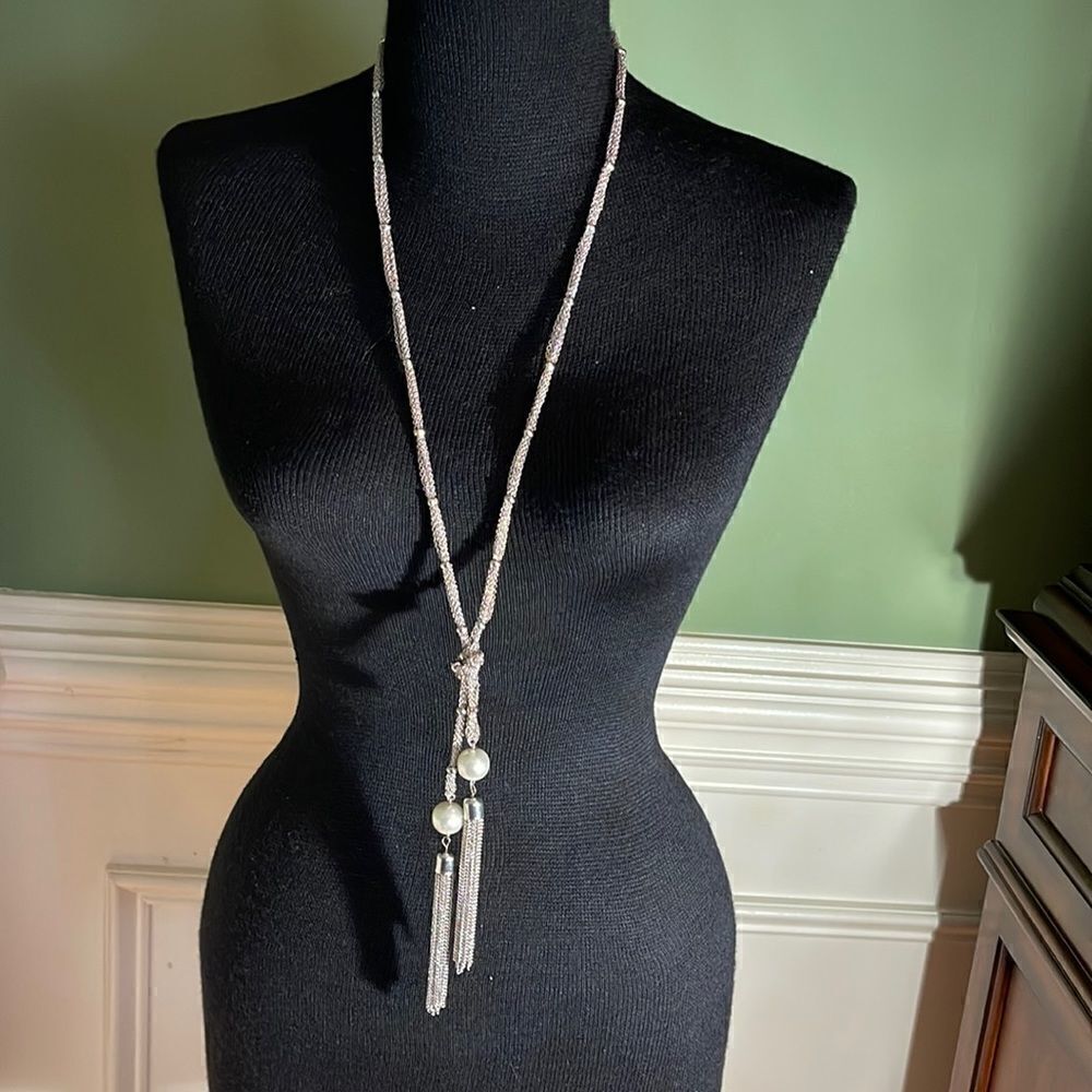 Lariat silver tone pearl necklace. Approximately 44” long with tassels